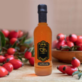 روغن رزهیپ میوه نسترن 500CC(ضد لک جای جوش پرایمر آرایشی مرطوب کننده آبرسان روشن کننده ضدجوش)